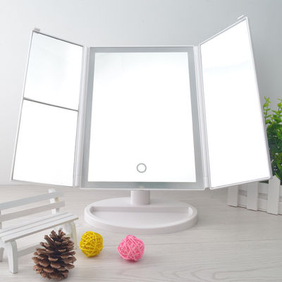 টাচস্ক্রিন LED ট্রিফোল্ড ভ্যানিটি মিরর 10x আলোকিত ভাঁজ ভ্রমণ মিরর